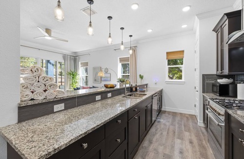 Seminole House | 6 Bedroom/7Bathroom Heated Pool Hot Tub Gym Game Room Outdoor Bar Near Beach