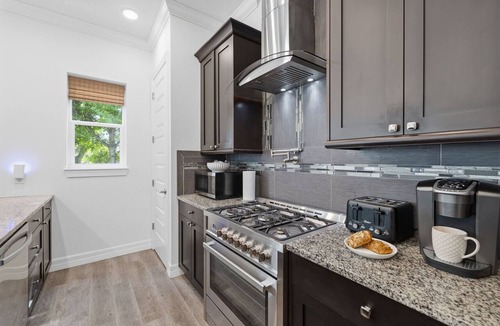 Seminole House | 6 Bedroom/7Bathroom Heated Pool Hot Tub Gym Game Room Outdoor Bar Near Beach