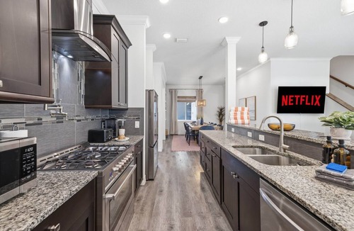Seminole House | 6 Bedroom/7Bathroom Heated Pool Hot Tub Gym Game Room Outdoor Bar Near Beach