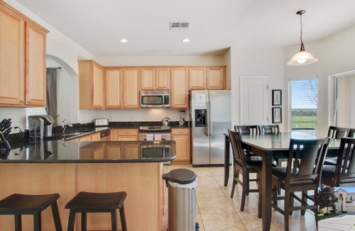 Windsor Hills House | 6 Bedroom Vacation Home with South Facing Pool in Windsor Hills close to Disney