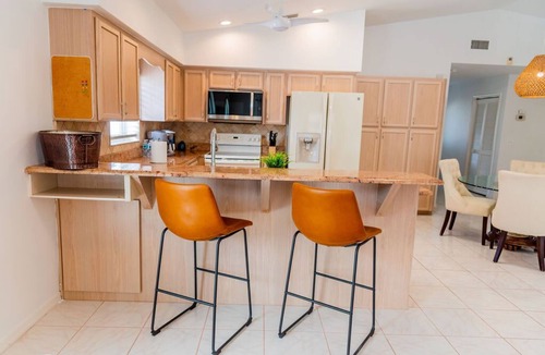 Naples Park House | 690 Paradise Shores Oasis | New Heated Pool & Spa