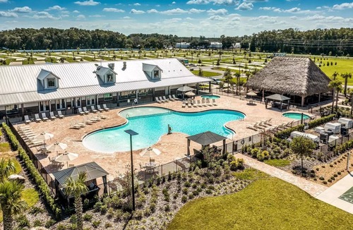 Fellowship RV Rental | 70' RV Pad at Champion's Run Luxury RV Resort with full hookups