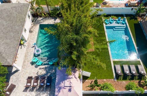 Jacksonville Beach House | 8 BR Compound | 2 Pools, Putting Green + Game Rooms