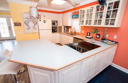 Flor-a-mar House | A bit of Key West in New Port Richey: Bright Home w/Pool & Boat Dock Access!