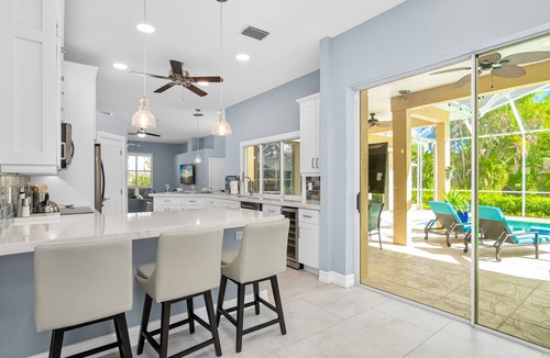 Naples House | A NAPLES STUNNER! HIGHLY Sought 3/2 Pool/Spa/Lake Home, Fully Stocked, New Furn.