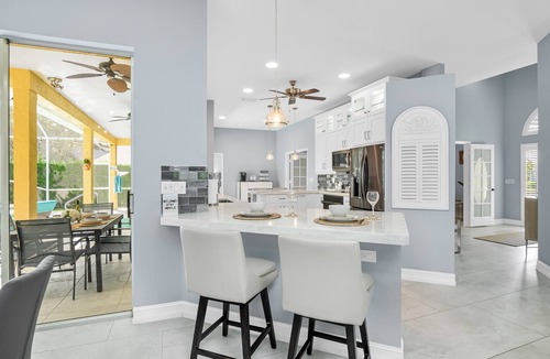 Naples House | A NAPLES STUNNER! HIGHLY Sought 3/2 Pool/Spa/Lake Home, Fully Stocked, New Furn.