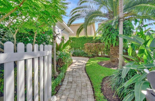 Juno Beach House | A Stone's Throw to the Beach or Lounge By Your Private Pool