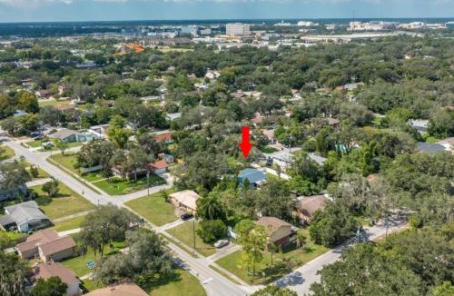 Terrace Park House | Adventure Awaits in Tampa Bay with Beautiful Decor 4BR with Backyard Oasis Near Busch Gardens & Adventure Island