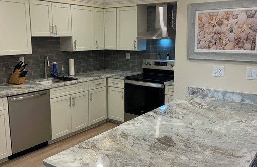 Hammock Bay Condo | ALL NEW/NO STEP LIVING W/PANORAMIC HAMMOCK BAY GOLF COURSE VIEW at MARCO SHORES