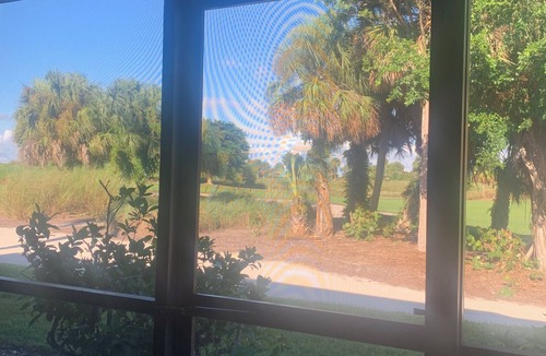 Hammock Bay Condo | ALL NEW/NO STEP LIVING W/PANORAMIC HAMMOCK BAY GOLF COURSE VIEW at MARCO SHORES