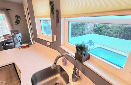 Avalon by the Sea House | Amazing Tropical Pool Home with Breezy Outdoor Living Space just Steps to Beach.