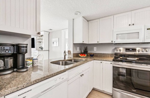 Amelia City Condo | Amelia Surf & Racquet Club B143 | 4th Floor Ocean Front Deluxe | Pools | Tennis Courts | Sleeps 6