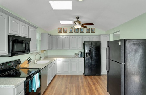 Ilexhurst House | Anthony Beach Cottages - Island Retreat Heated pool home w/4 bedrooms 3 baths