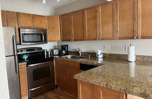 Trailer Estates Condo | Awesome first-floor Palm Aire condo close to University Town Center!