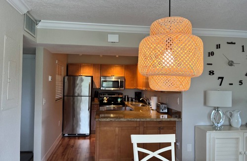 Trailer Estates Condo | Awesome first-floor Palm Aire condo close to University Town Center!