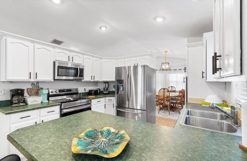 Jupiter House | Backyard retreat with BBQ Patio & game room