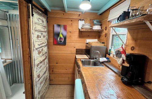 Saluda House | Bamboo bungalow at Camp David. Pond-front, pet friendly tiny home retreat