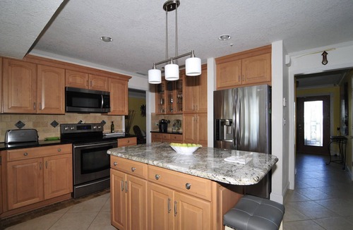 Port Canaveral House | Banana River Beauty-Five bedroom waterfront home with heated pool and spa