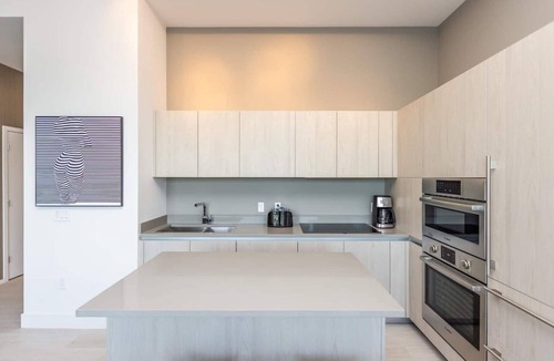 Seybold Apartment | Bay views, luxury finishes, and coastal chic in this 1-bedroom heaven