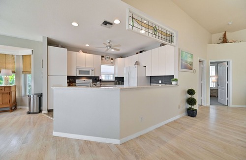 Estero Bay Shores House | Baydream Believer, "Come Sail Away"