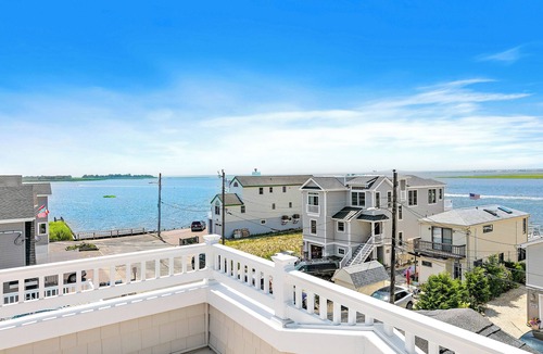 Ship Bottom House | Bayfront beauty! 4 bedroom home on the water with dock! Includes toys!