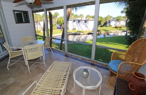 Whitney Beach Condo | Bayside 2BR on Whitney Beach w Canal Views, Pool, and Private Lanai by RVA