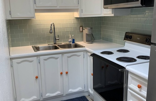 Port Canaveral Condo | Beach Bum Too…pool, pet friendly, and one block from the beach!