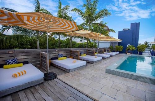 City Center House | Beach Escape! Pet-Friendly Property, On-site Pools, Near Fisher Island Beach!