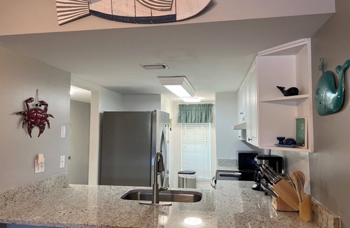 Point East Condo | Beach front condo with ocean views and community pool. 2/2 on non drive beach.
