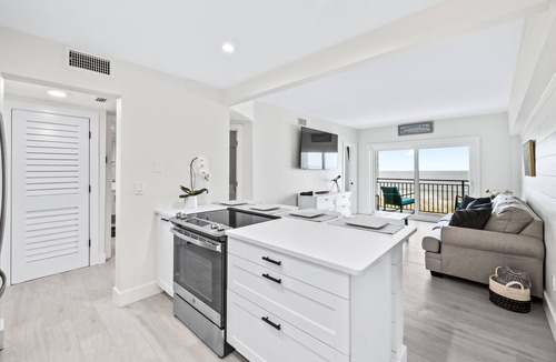 Jacksonville Beach Condo | Beach Front Balcony Above the Dunes Directly on the Ocean