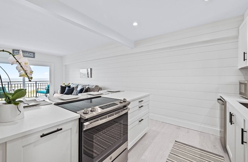 Jacksonville Beach Condo | Beach Front Balcony Above the Dunes Directly on the Ocean