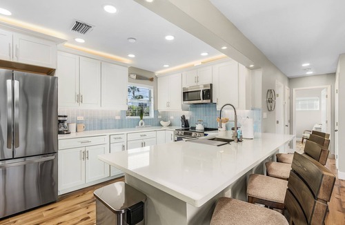 Hills T P House | Beach Haven: 4BR Home, Heated Pool, Walk to Beach!