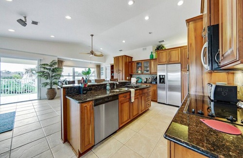 Marineland Acres House | Beach Home with Amazing Oasis Pool, Spa, Waterfall, Fire Pit, Bikes