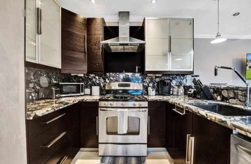 Hendricks and Venice Isles Apartment | Beach Isles Modern 1BR Waterfront Apartment with Patio