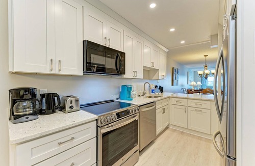 Bradenton Beach Condo | Beach Palms 6B-Beach 1 Minute WalkHeated Pool-Free Wi-Fi-Dock-Surrounded By Wate