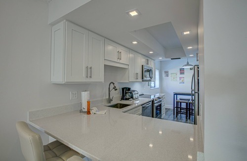Bradenton Beach Condo | Beach Palms 7A-Beach 1 Minute Walk-Heated Pool-Free Wi-Fi-Dock-Surrounded By Wat