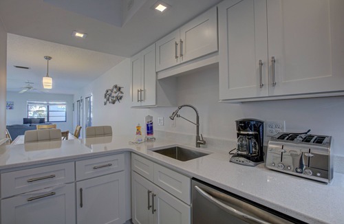 Bradenton Beach Condo | Beach Palms 7A-Beach 1 Minute Walk-Heated Pool-Free Wi-Fi-Dock-Surrounded By Wat
