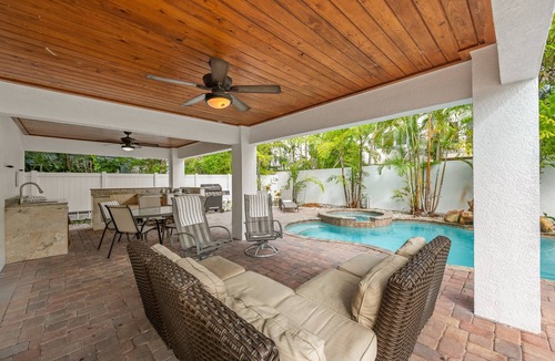 Holmes Beach House | Beach View Retreat! 5BR Home with Pool, Spa, Rooftop Deck and Walk to Beach