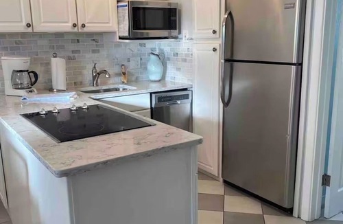 North Redington Beach Condo | Beachfront Bliss! Right on the Gulf of Mexico! On the sandy white beach!