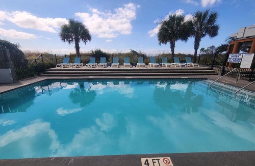 Windy Hill Apartment | Beachfront Bliss 3BR Oceanfront Condo with Pool and Hot Tub