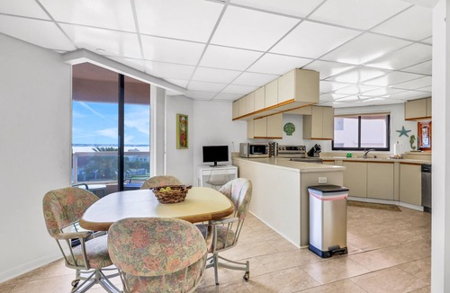 Sand Key Condo | Beachfront condo with multiple balconies, heated pool, gym, hot tub & AC