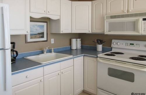 South Island Condo | Beachfront Condo At Bargain Price! Resort Heated Pool! Tennis Courts! Million Dollar View!
