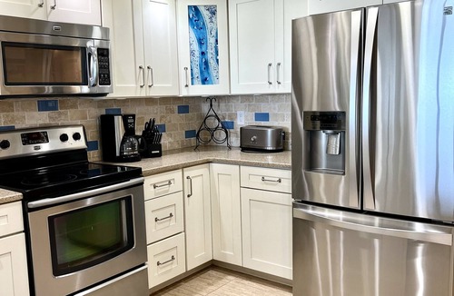 Indian Shores Condo | Beachfront condo w/large balcony perfect for dolphin and sunset watching.