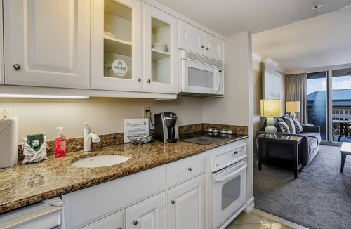 Marco Island Condo | Beachfront condo with a pool, a hot tub, central AC, & on-site restaurants