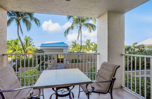Marco Island Condo | Beachfront condo with a pool, a hot tub, central AC, & on-site restaurants