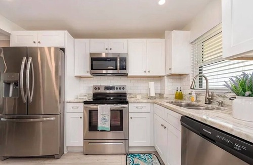Sand Key Condo | Beachfront living experience! Enjoy amazing sunsets and views.