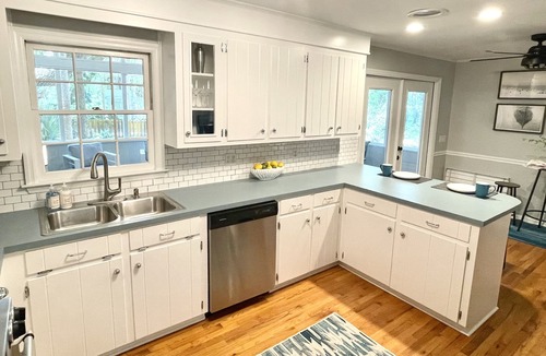 Isle of Palms House | Beachy haven with a beautiful screened in porch and big yard