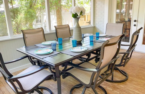 Isle of Palms House | Beachy haven with a beautiful screened in porch and big yard