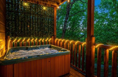 Sevierville Ski Chalet | Bearadise-Private Hot Tub Cabin with 2 LED Decks, Pool Table, Board Games and Wet Bar