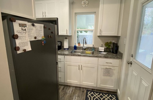 Ocala House | Beat the heat in two screened patios!